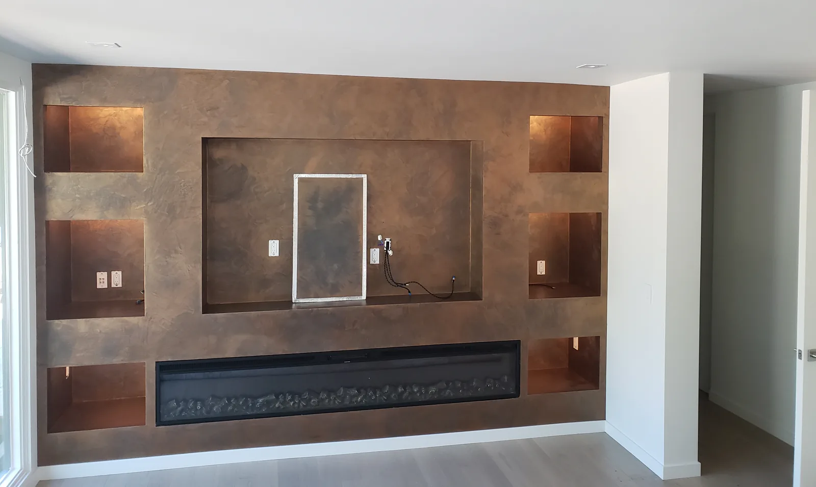 Decorative plaster wall with hand-troweled texture and depth